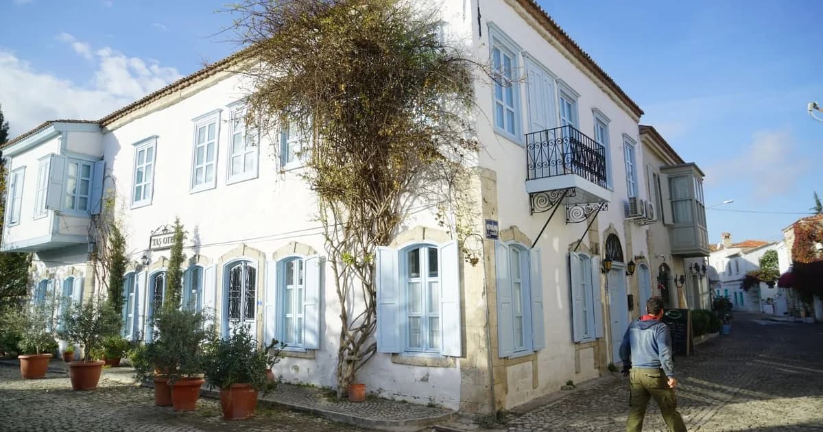 Stone houses along a street in Alaçatı